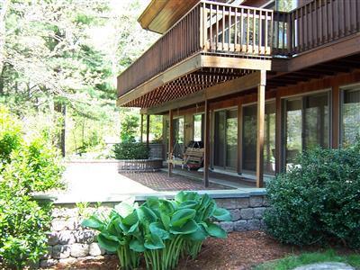 Undisclosed Address Centerville, MA 02632 - Photo 20 of 21 a front view of a house with garden