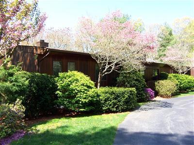 Undisclosed Address Centerville, MA 02632 - Photo 4 of 21 a view of flowers in middle of garden
