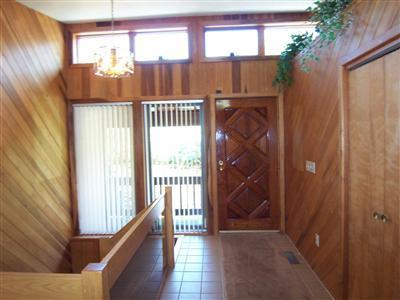 Undisclosed Address Centerville, MA 02632 - Photo 9 of 21 a view of entryway with wooden floor