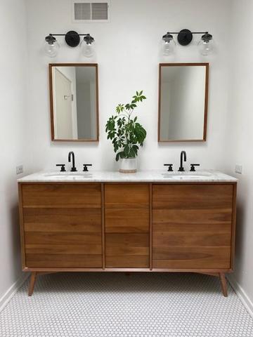 14 North Sangamon Street, Unit 403 Chicago, IL 60607 - Photo 9 of 16 a bathroom with a sink vanity and mirror