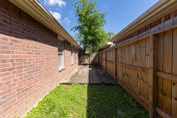 a view of backyard with green space