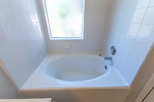 a bathroom with a bathtub