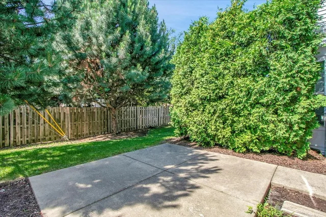 a backyard of a house with lots of green space