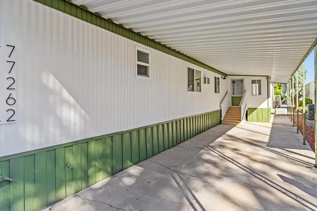 a view of backyard with deck and deck