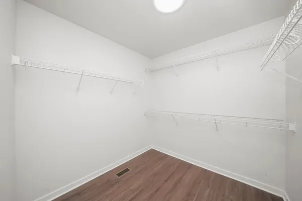a view of a room with racks on the wall