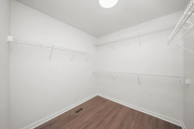 a view of a room with racks on the wall