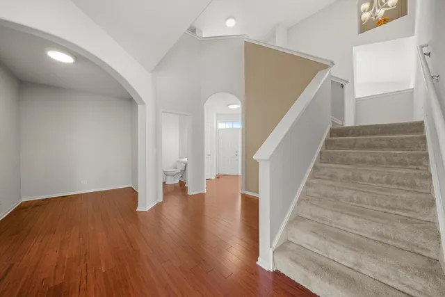 a view of entryway with wooden floor