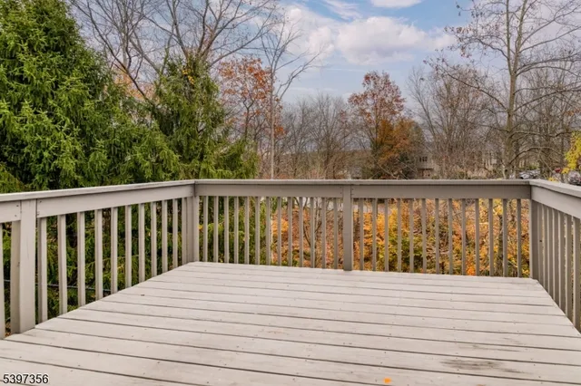 a kitchen with stainless steel appliances granite countertop a refrigerator and microwave