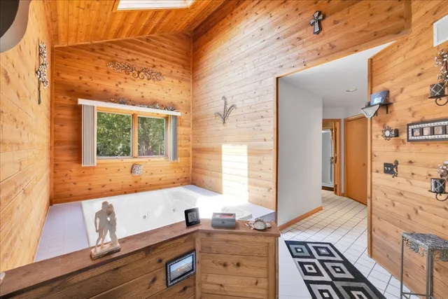 a kitchen with a sink and a stove next to a window