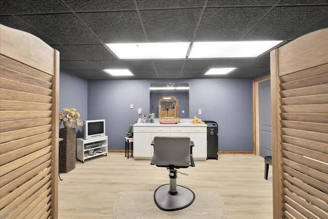 a view of living room with furniture and flat screen tv