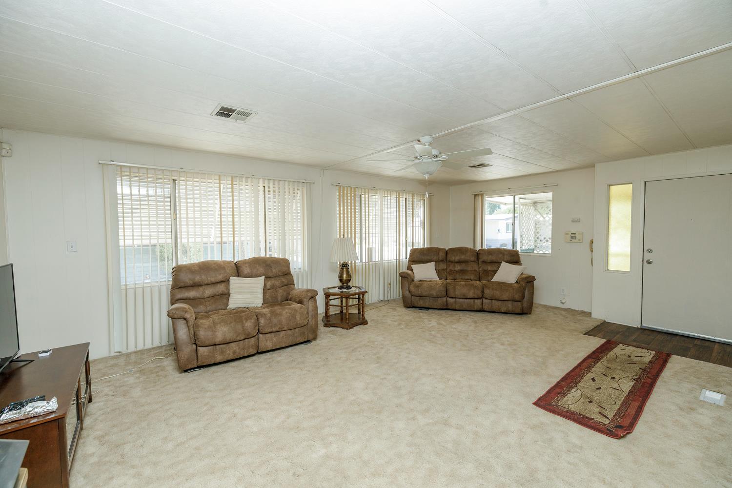 4837 Faith Home Road, Unit 4 Ceres, CA 95307 - Photo 12 of 42 a living room with furniture and a couch