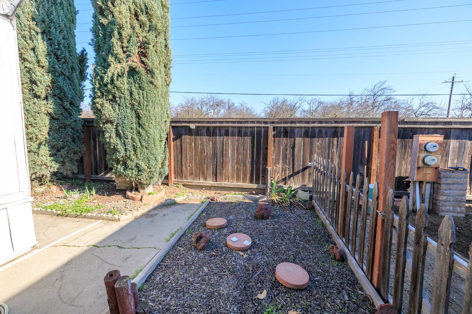 4837 Faith Home Road, Unit 4 Ceres, CA 95307 - Photo 35 of 42 a view of a house with backyard and porch