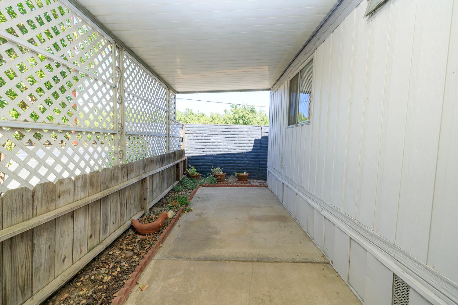 4837 Faith Home Road, Unit 4 Ceres, CA 95307 - Photo 7 of 42 a view of balcony and wooden floor
