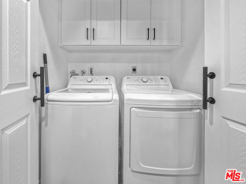 10401 Garden Grove Boulevard, Unit 44 Garden Grove, CA 92843 - Photo 14 of 26 a utility room with dryer and washer