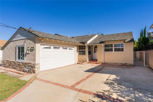 a front view of a house with a outdoor space