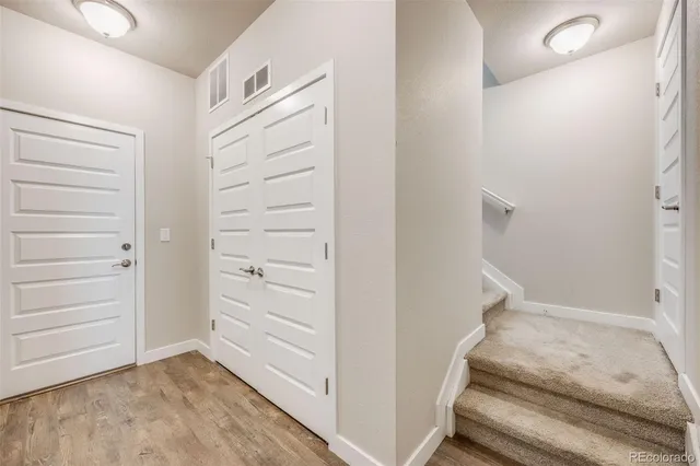 a view of an empty walk in closet