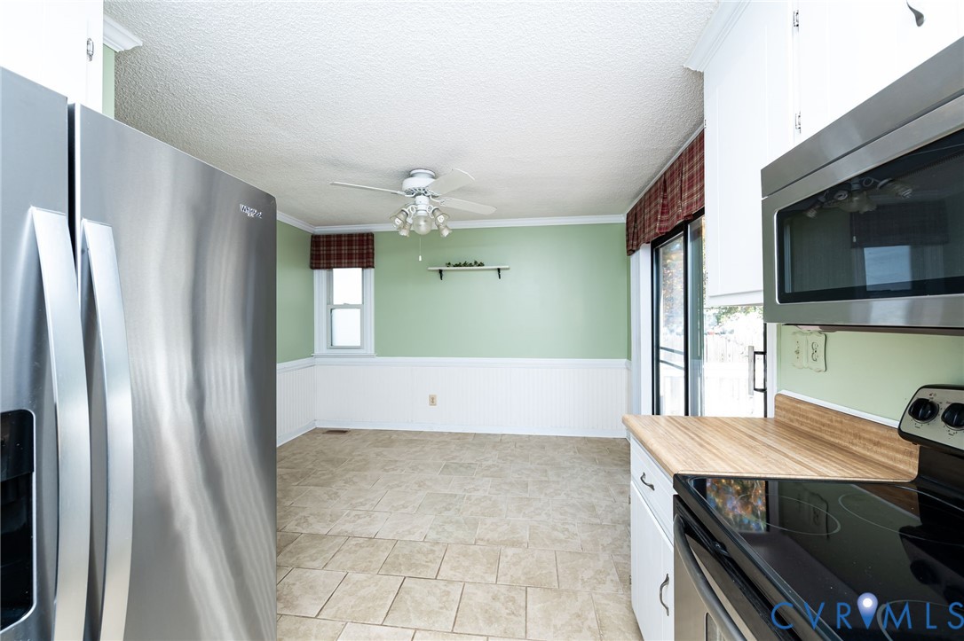 201 Monath Road Chesterfield, VA 23236 - Photo 16 of 30 a view of kitchen with cabinets and wooden floor