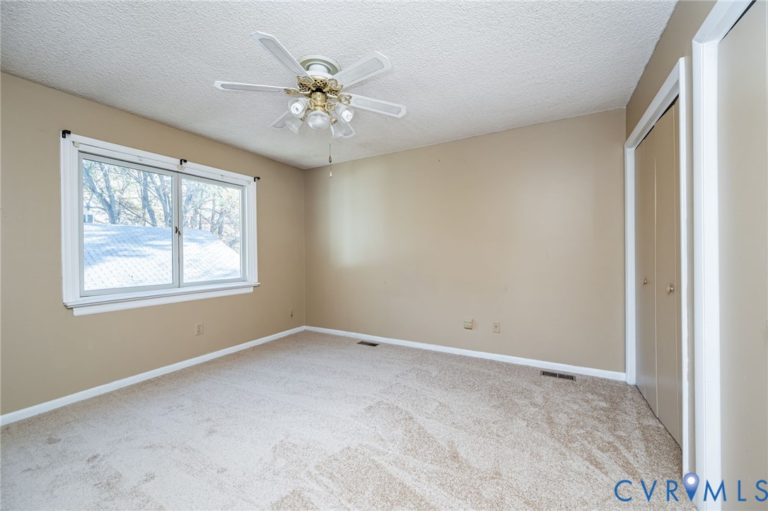 201 Monath Road Chesterfield, VA 23236 - Photo 18 of 30 a view of an empty room with a window