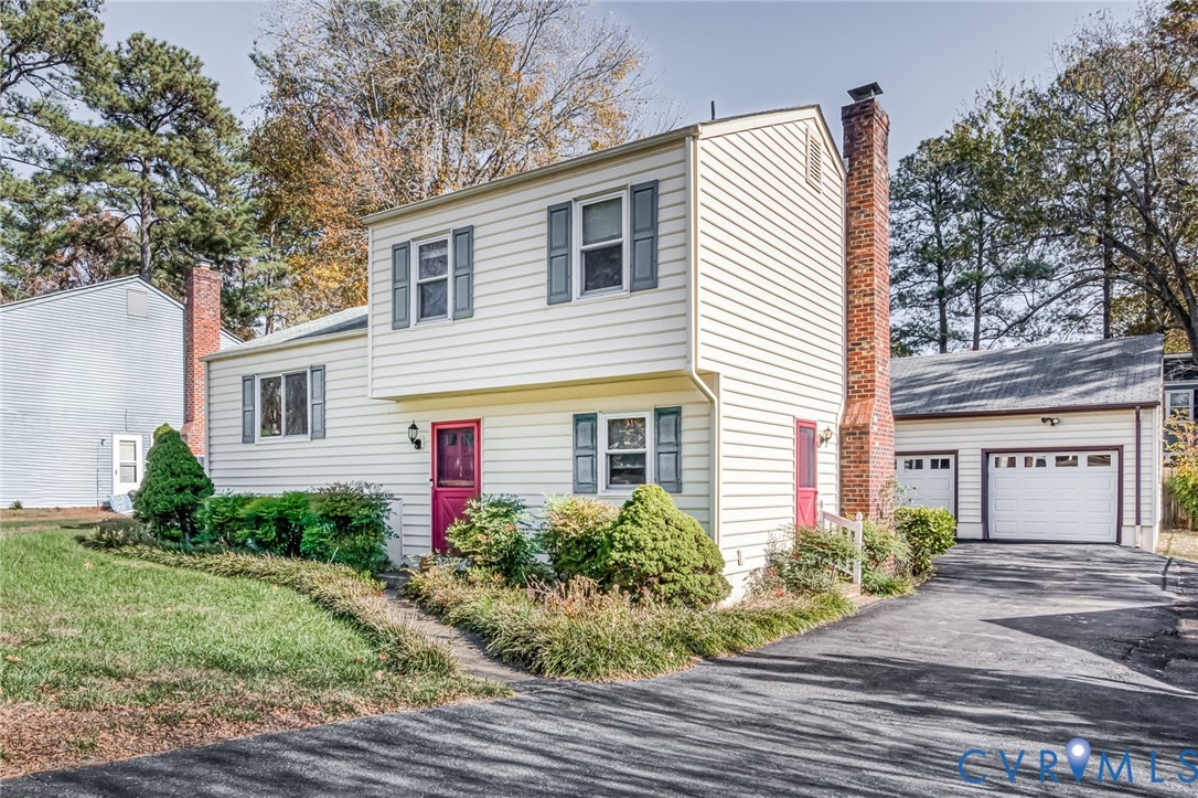 201 Monath Road Chesterfield, VA 23236 - Photo 3 of 30 a front view of a house with a yard