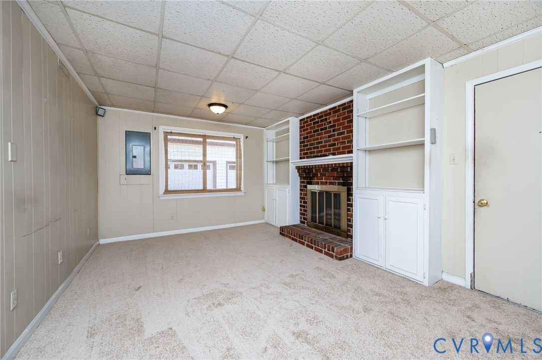 201 Monath Road Chesterfield, VA 23236 - Photo 7 of 30 an empty room with windows and fireplace