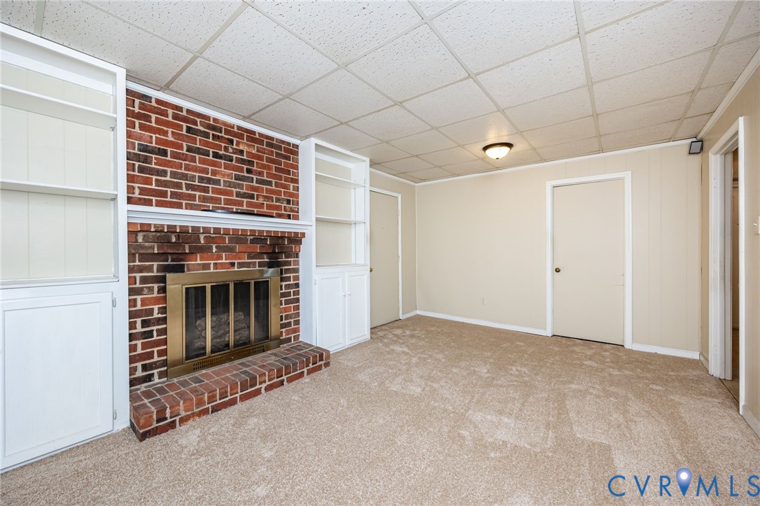 201 Monath Road Chesterfield, VA 23236 - Photo 8 of 30 a view of empty room with dishwasher and fireplace