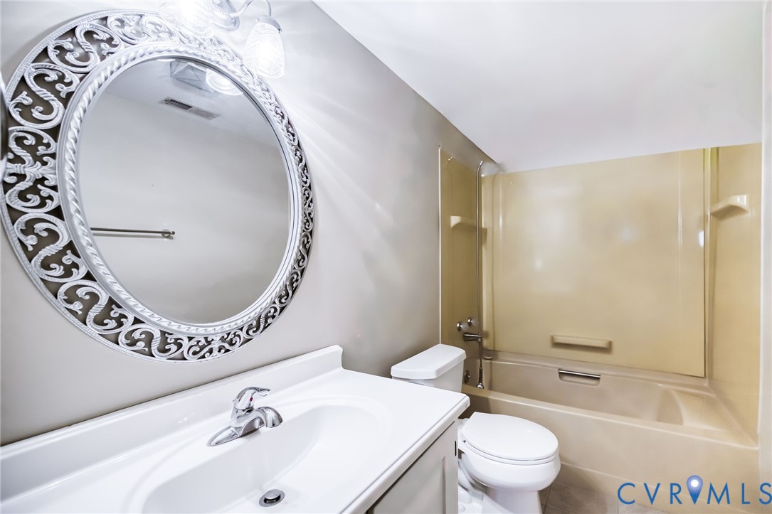201 Monath Road Chesterfield, VA 23236 - Photo 10 of 30 a bathroom with a sink and a mirror