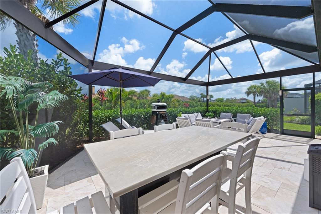 15214 Tolmino Street Naples, FL 34114 - Photo 27 of 47 a view of outdoor space yard and patio