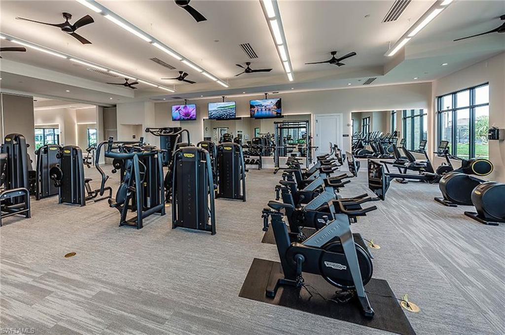 15214 Tolmino Street Naples, FL 34114 - Photo 41 of 47 a view of a room with gym equipment