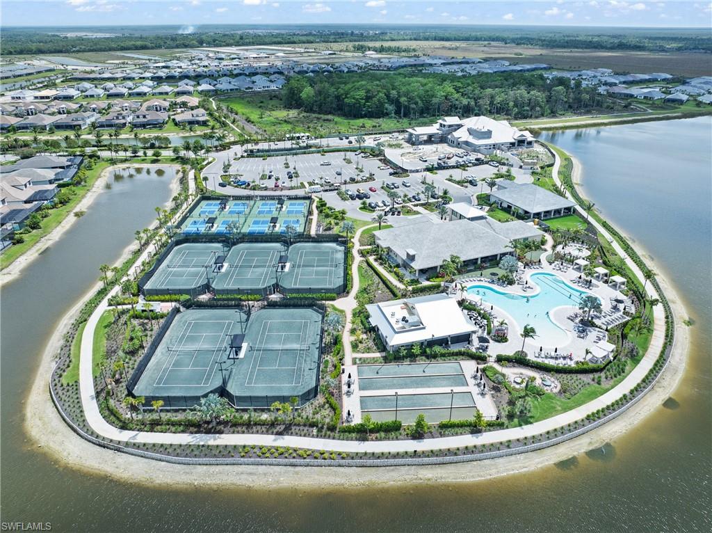 15214 Tolmino Street Naples, FL 34114 - Photo 43 of 47 a view of a lake view