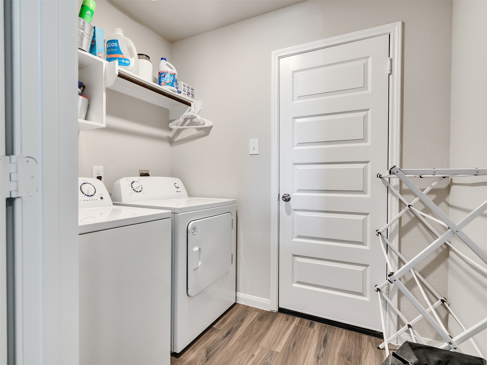 2416 Bluefish Court Conroe, TX 77384 - Photo 20 of 45 a utility room with dryer and washer