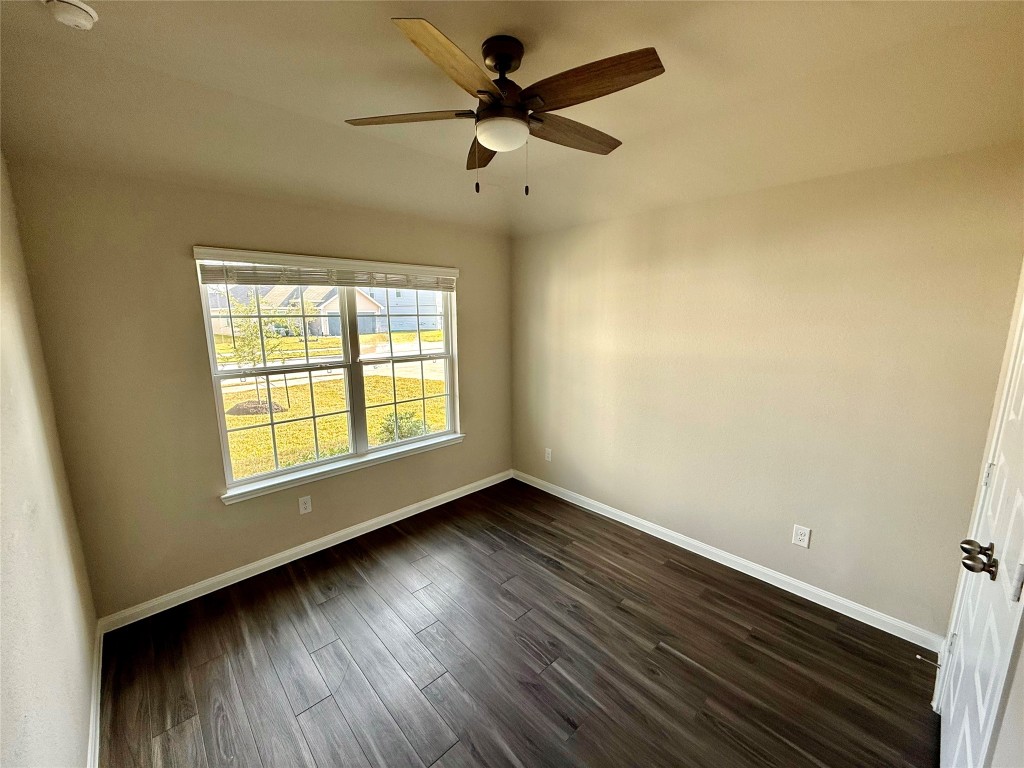 5322 Briana Dee Drive Rosharon, TX 77583 - Photo 11 of 20 wooden floor in an empty room with a window