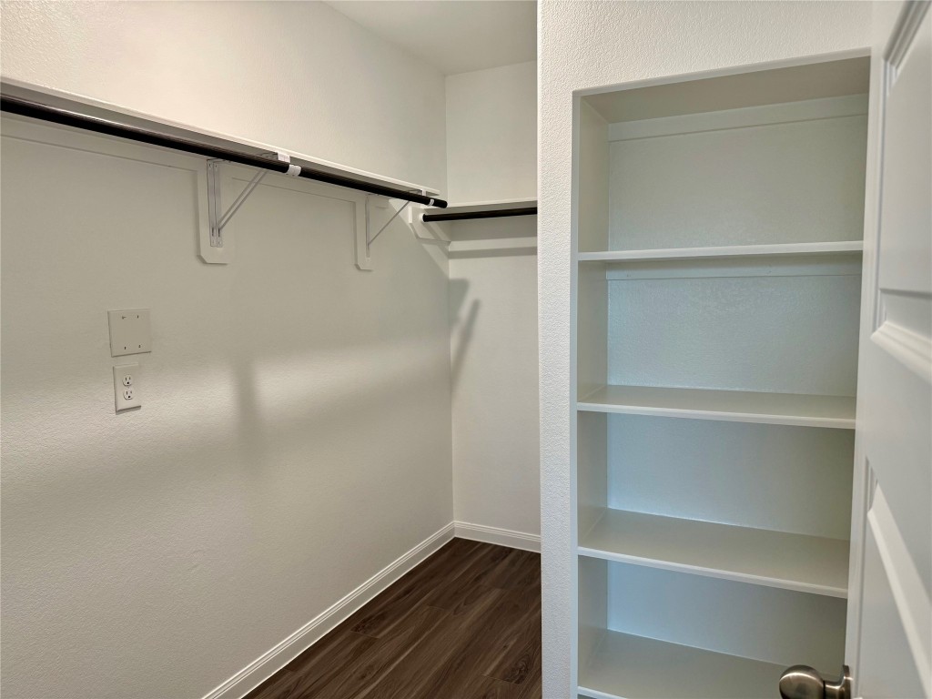 5322 Briana Dee Drive Rosharon, TX 77583 - Photo 13 of 20 a view of walk in closet with empty racks