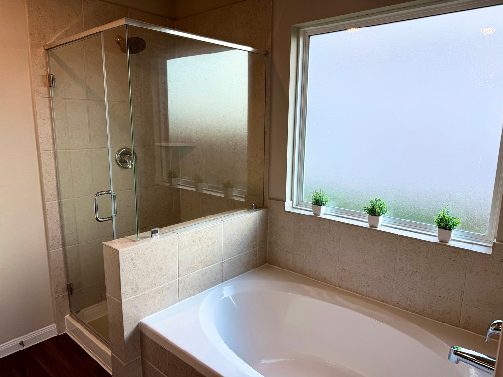 5322 Briana Dee Drive Rosharon, TX 77583 - Photo 14 of 20 a bathroom with a bathtub and a shower