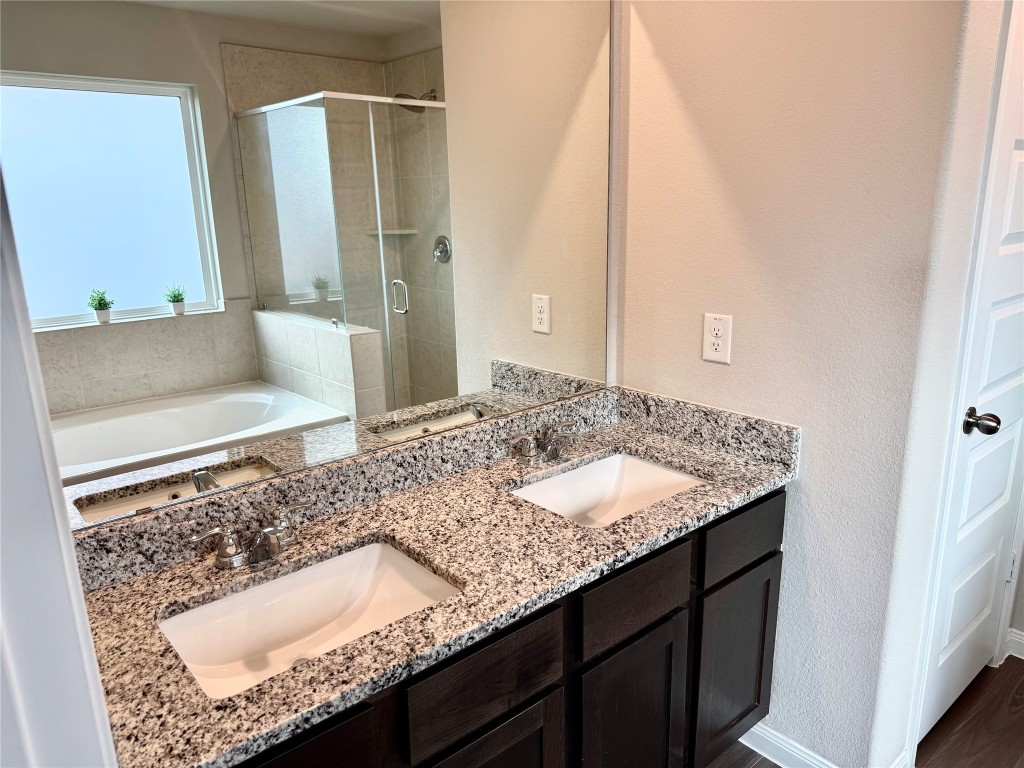 5322 Briana Dee Drive Rosharon, TX 77583 - Photo 16 of 20 a bathroom with a granite countertop sink and a mirror