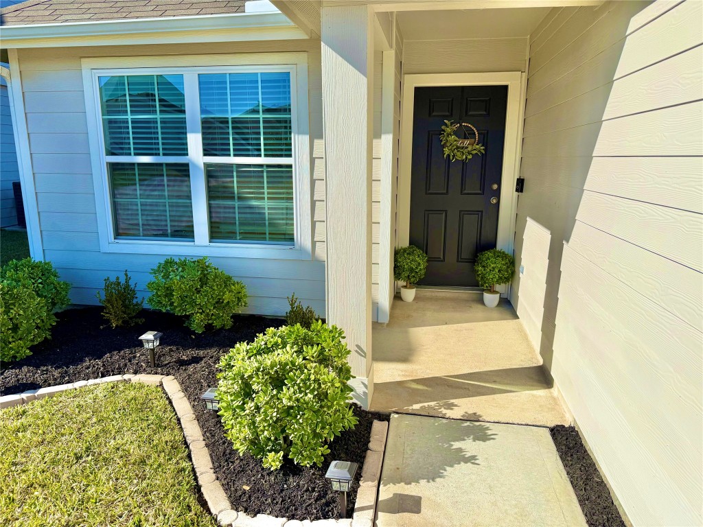 5322 Briana Dee Drive Rosharon, TX 77583 - Photo 3 of 20 a front view of a house with a yard