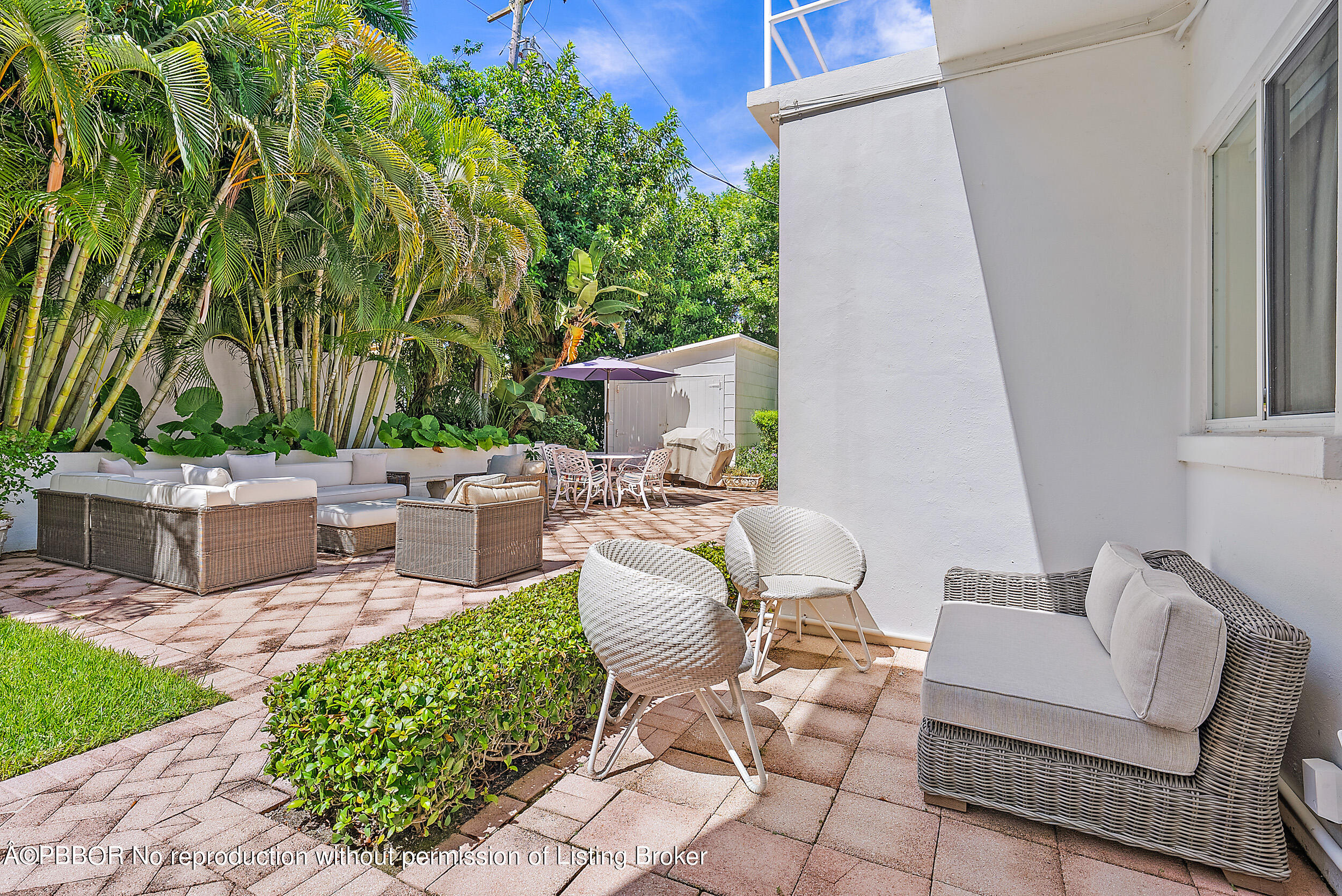 220 Atlantic Avenue, Unit 3 Palm Beach, FL 33480 - Photo 26 of 36 a view of a patio with chairs and a potted plant