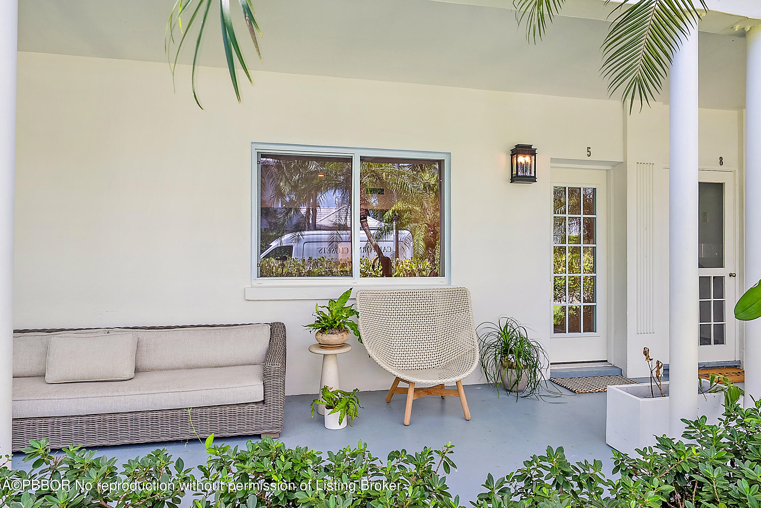 220 Atlantic Avenue, Unit 3 Palm Beach, FL 33480 - Photo 28 of 36 a living room with furniture and a potted plant