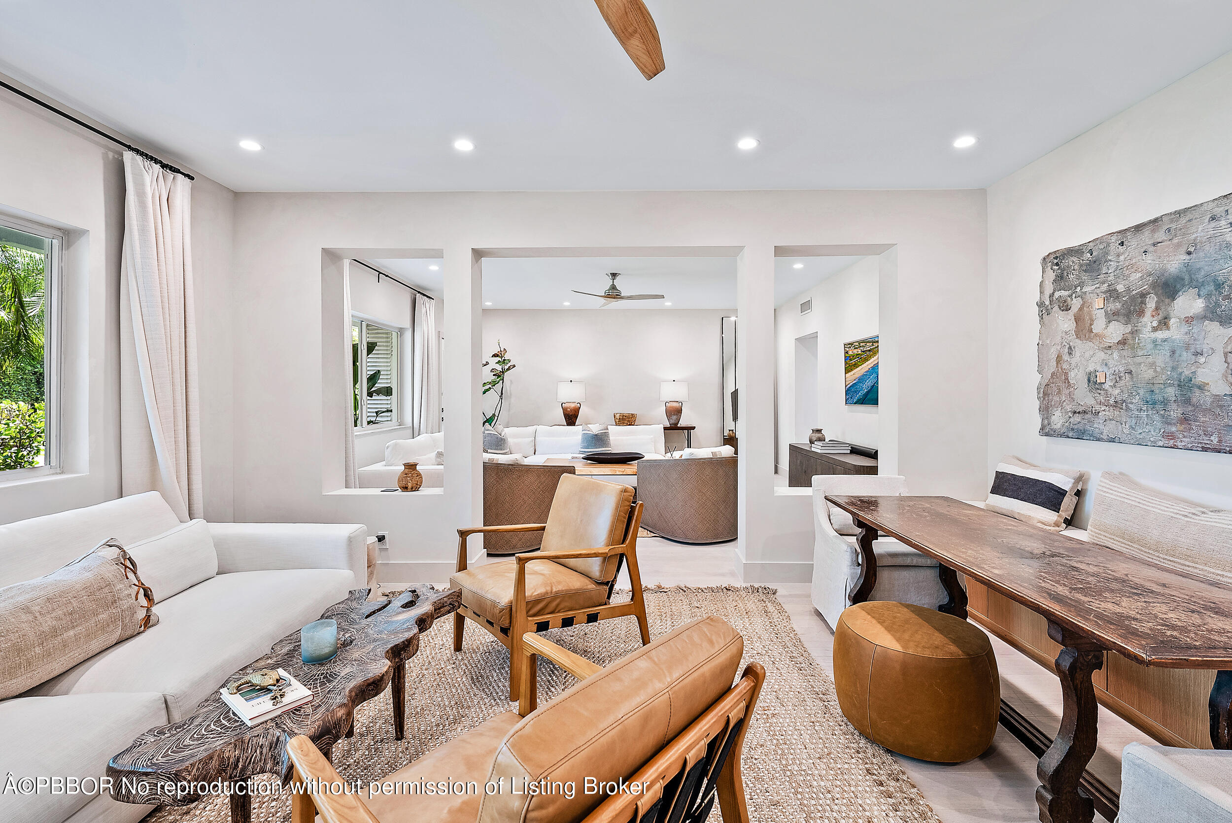 220 Atlantic Avenue, Unit 3 Palm Beach, FL 33480 - Photo 3 of 36 a living room with furniture and a large window