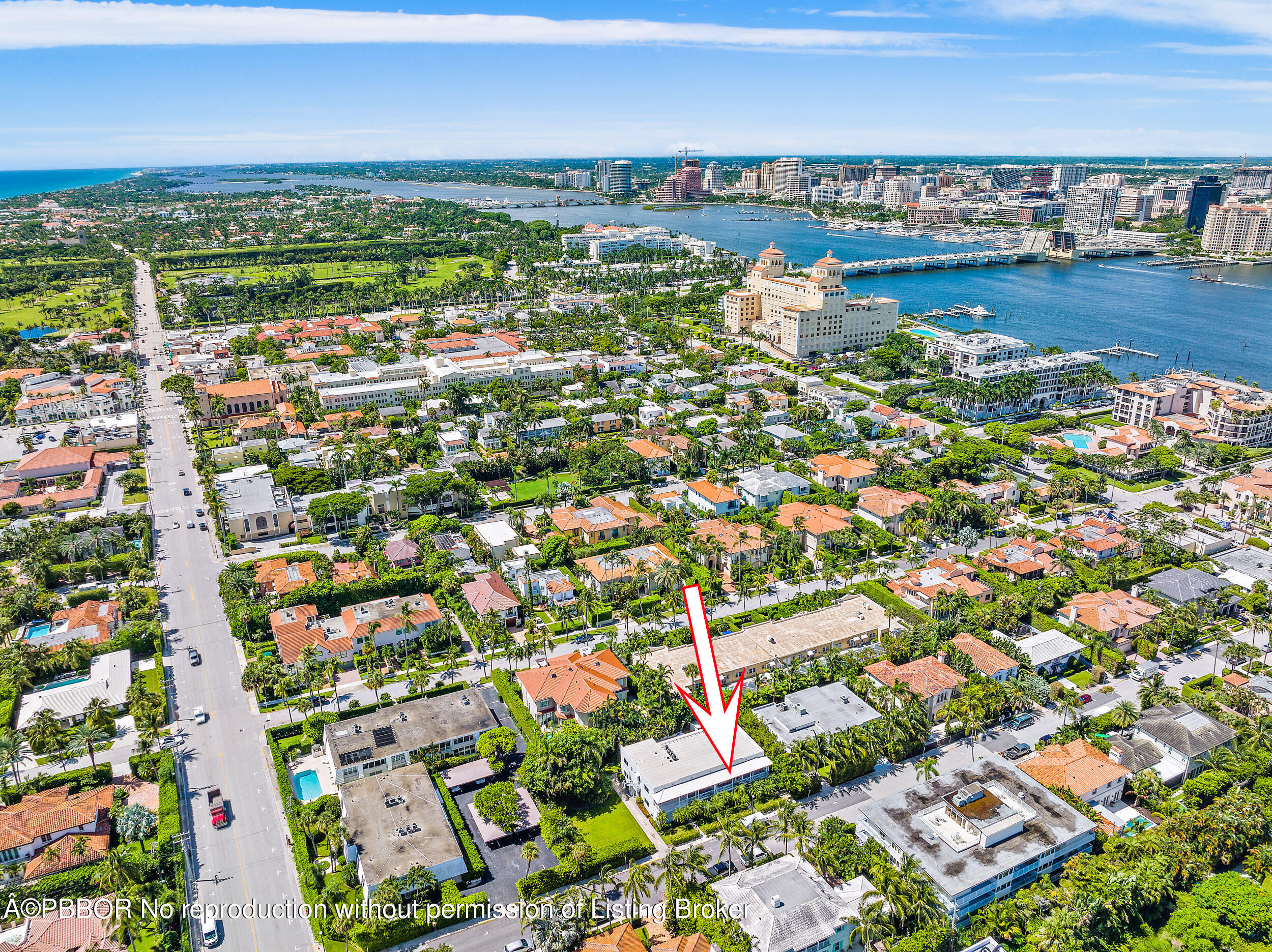 220 Atlantic Avenue, Unit 3 Palm Beach, FL 33480 - Photo 35 of 36 an aerial view of a city with lots of residential buildings ocean and mountain view in back
