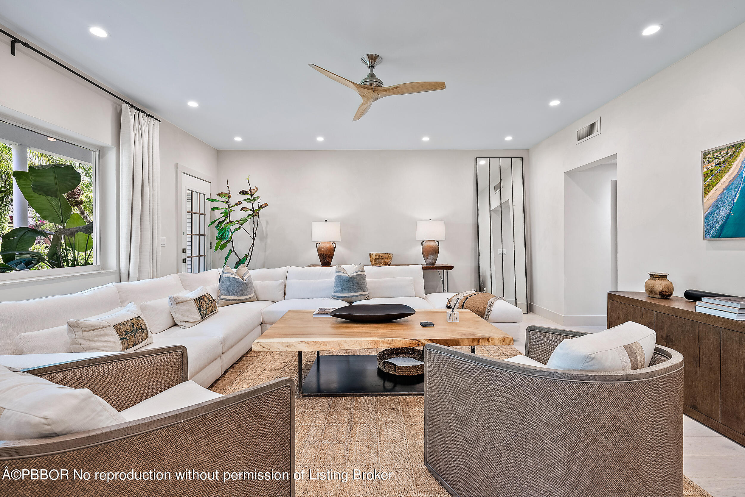220 Atlantic Avenue, Unit 3 Palm Beach, FL 33480 - Photo 7 of 36 a living room with furniture and a large window