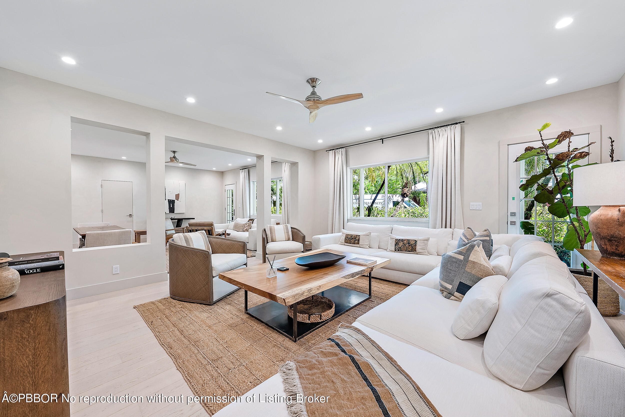 220 Atlantic Avenue, Unit 3 Palm Beach, FL 33480 - Photo 9 of 36 a living room with furniture rug and window