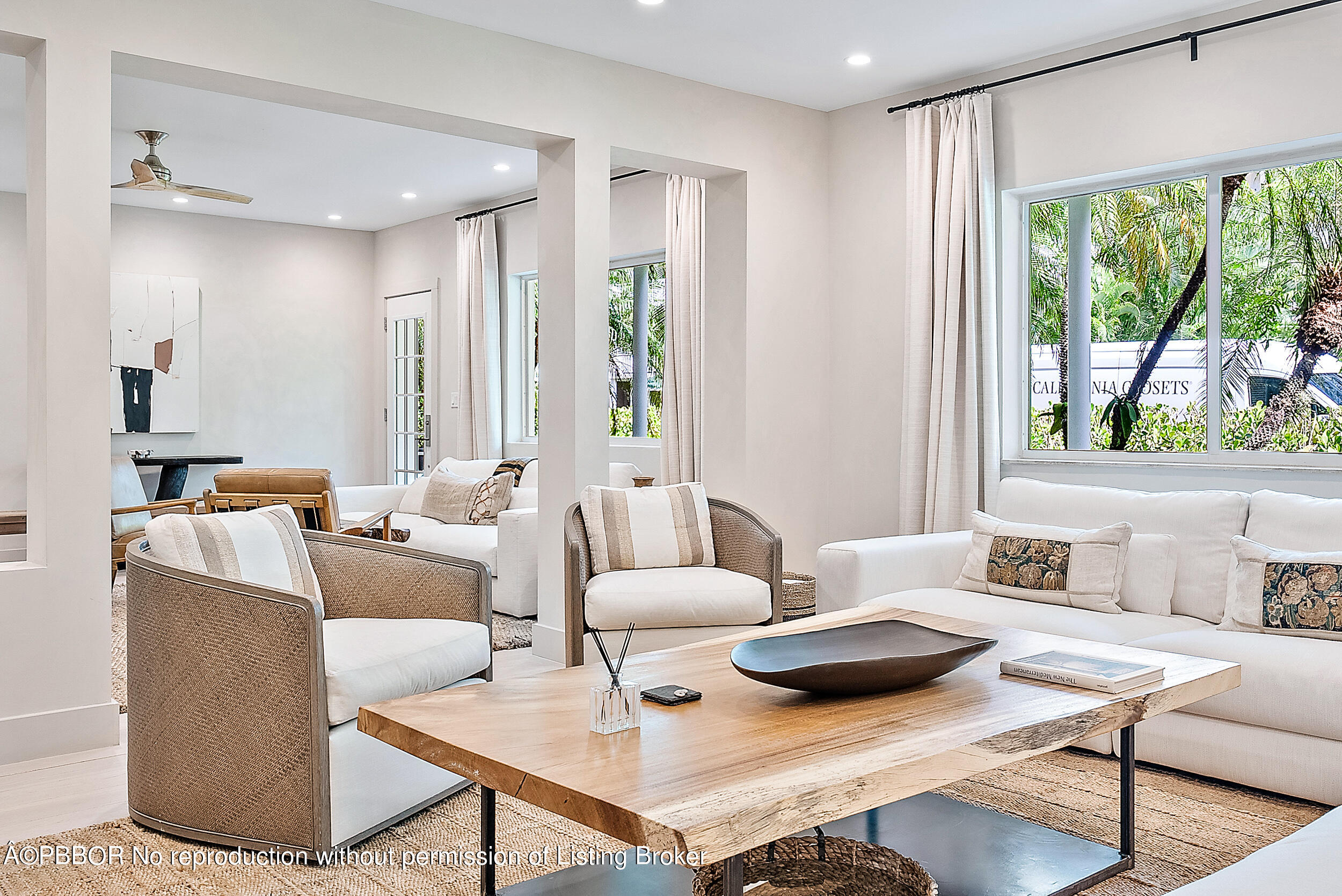 220 Atlantic Avenue, Unit 3 Palm Beach, FL 33480 - Photo 10 of 36 a living room with furniture and a large window