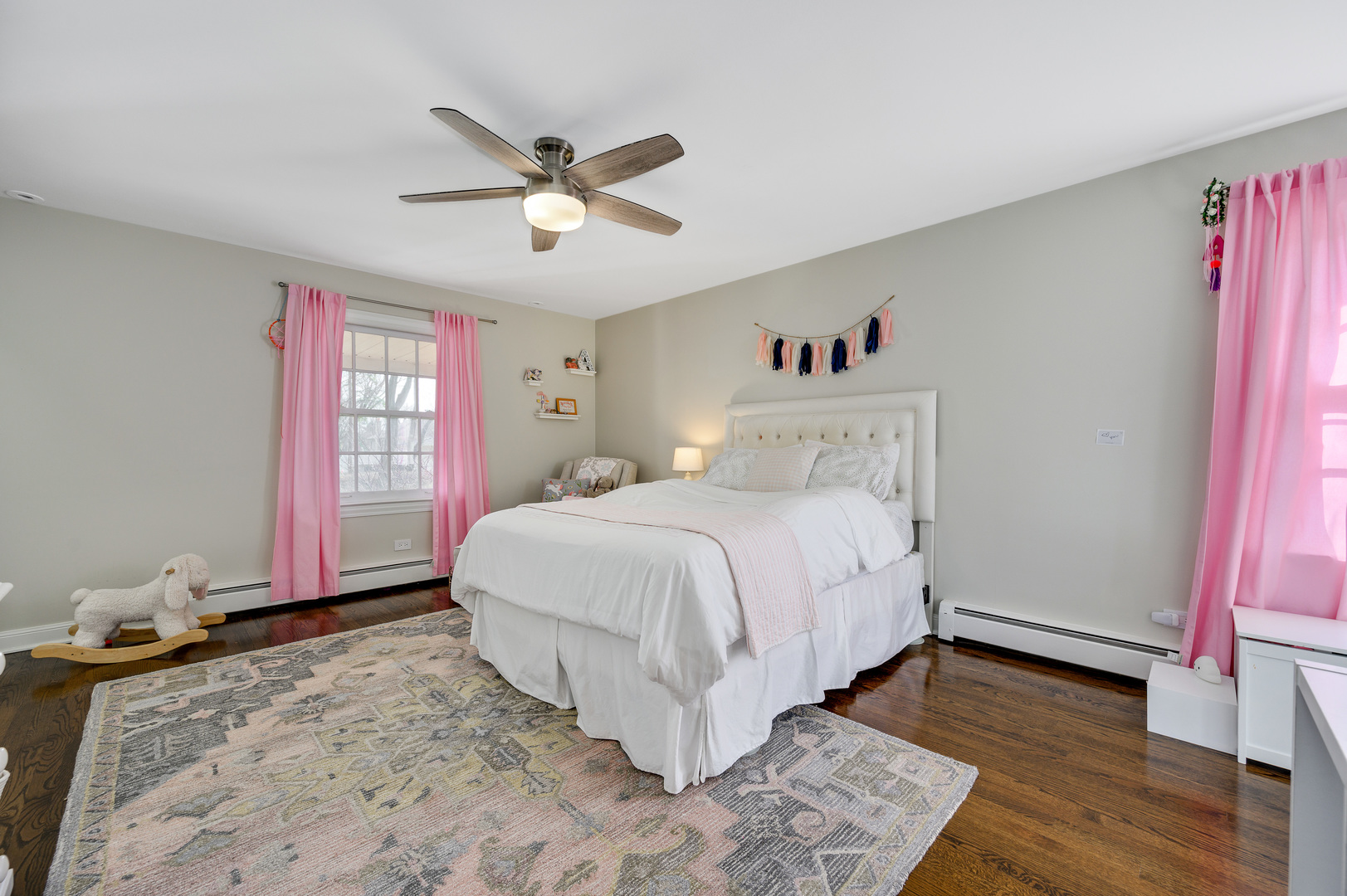 2200 Swainwood Drive Glenview, IL 60025 - Photo 18 of 31 a bedroom with a bed and a window