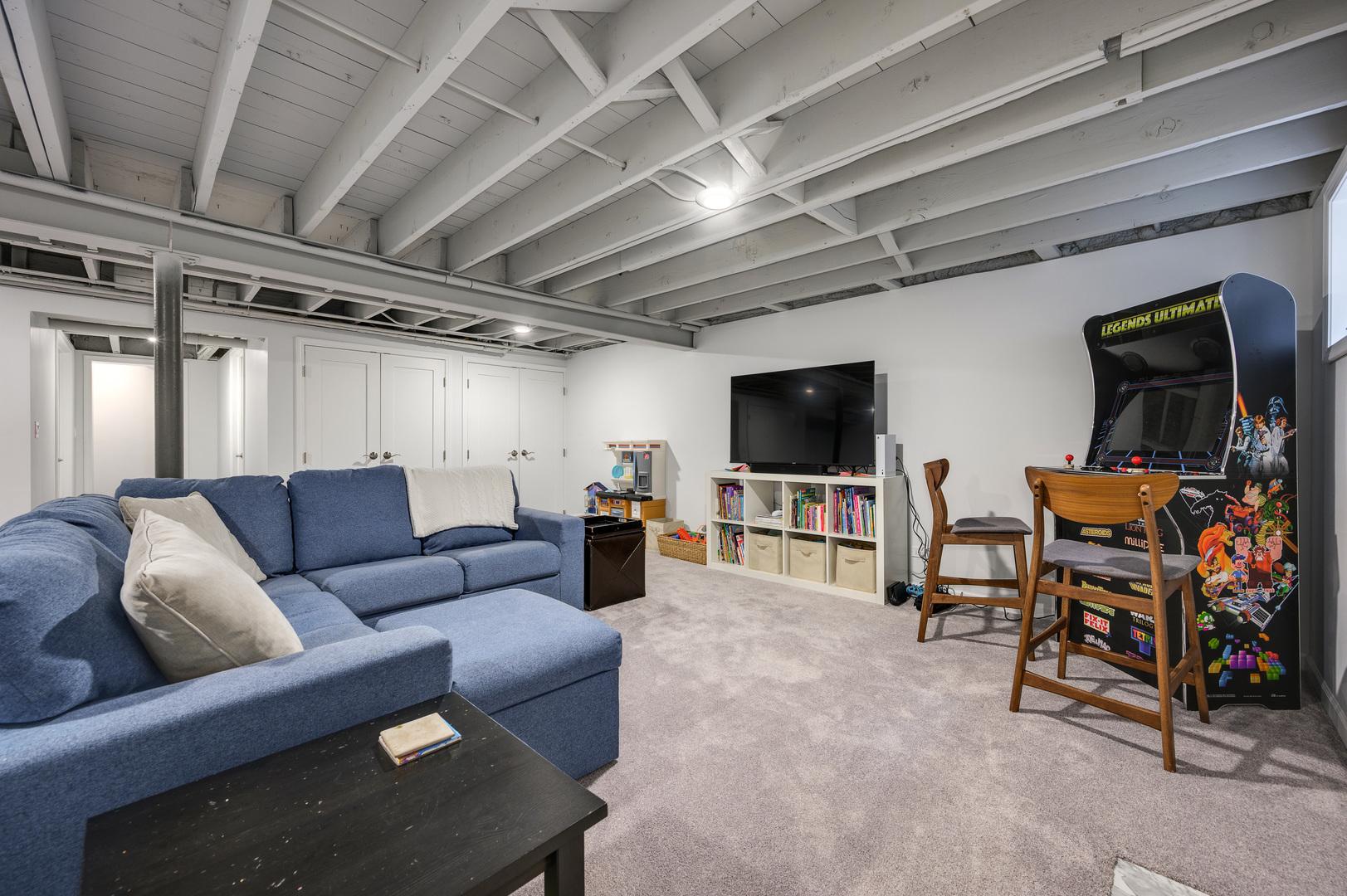 2200 Swainwood Drive Glenview, IL 60025 - Photo 25 of 31 a living room with furniture and a flat screen tv