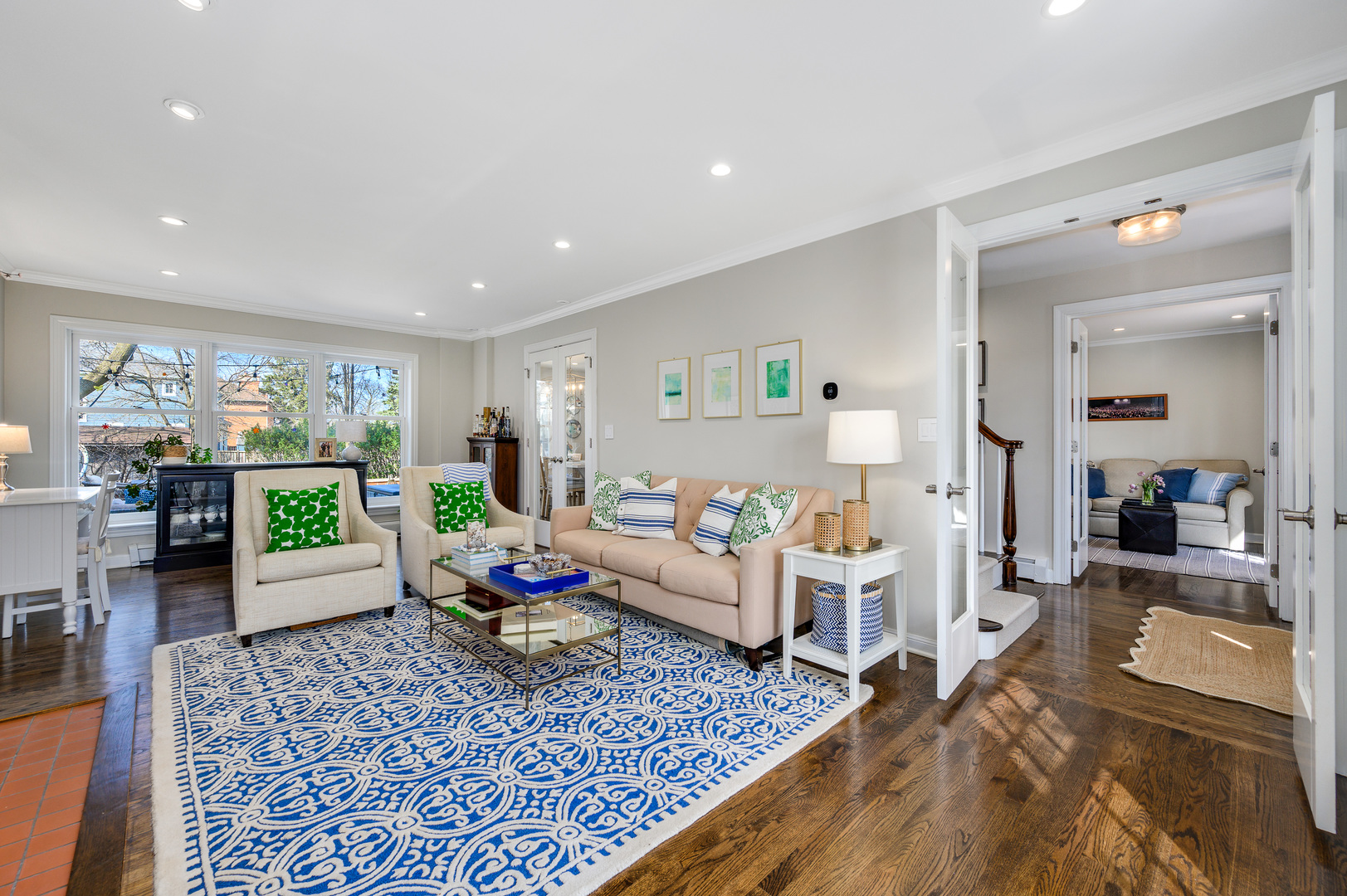 2200 Swainwood Drive Glenview, IL 60025 - Photo 4 of 31 a living room with furniture floor to ceiling window and a table
