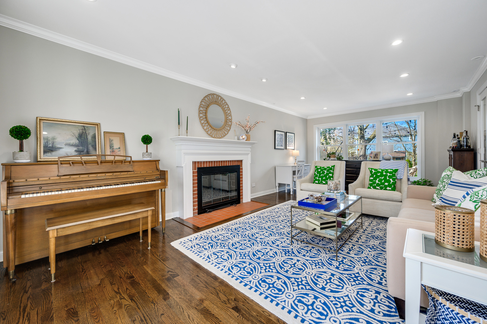 2200 Swainwood Drive Glenview, IL 60025 - Photo 5 of 31 a living room with furniture a rug and a fireplace