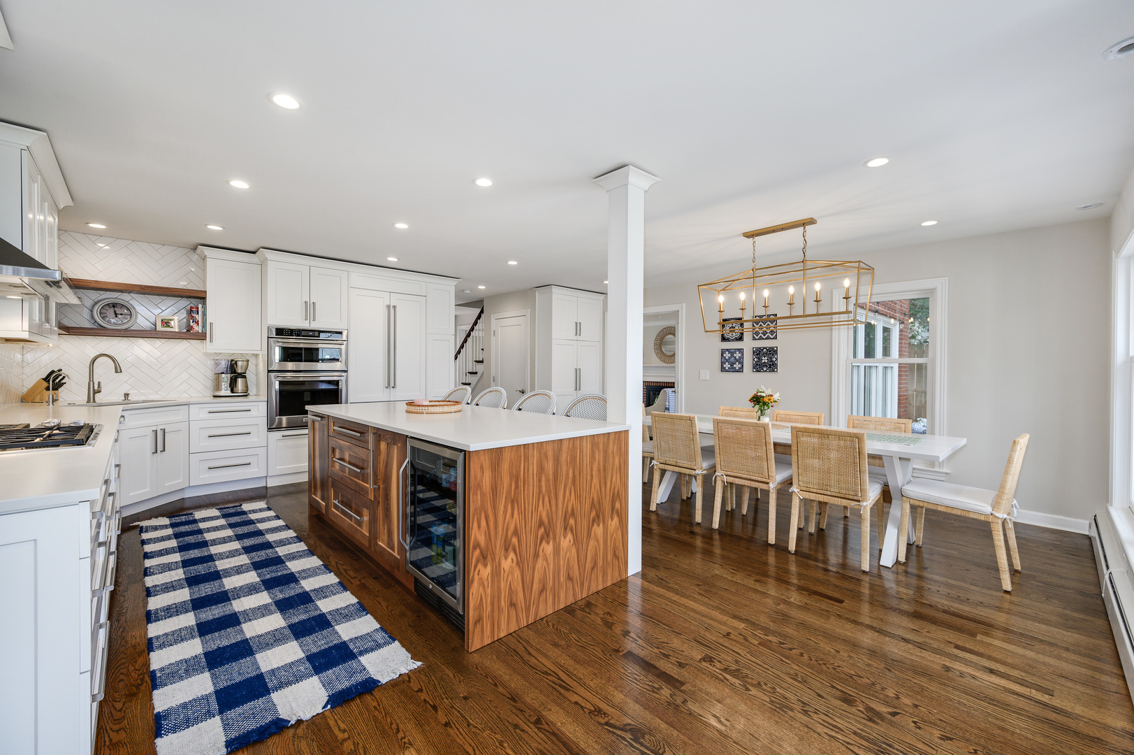 2200 Swainwood Drive Glenview, IL 60025 - Photo 9 of 31 a kitchen with stainless steel appliances kitchen island granite countertop a sink and cabinets