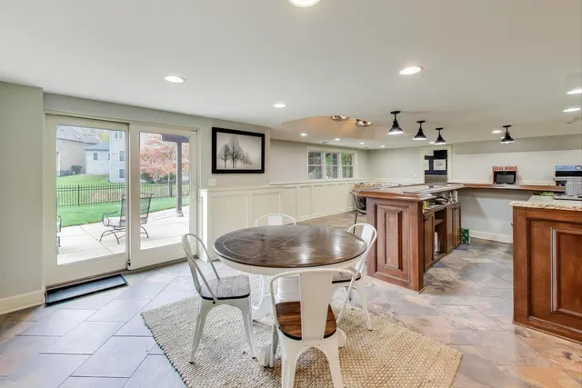 a living room with a flat screen tv and a couch