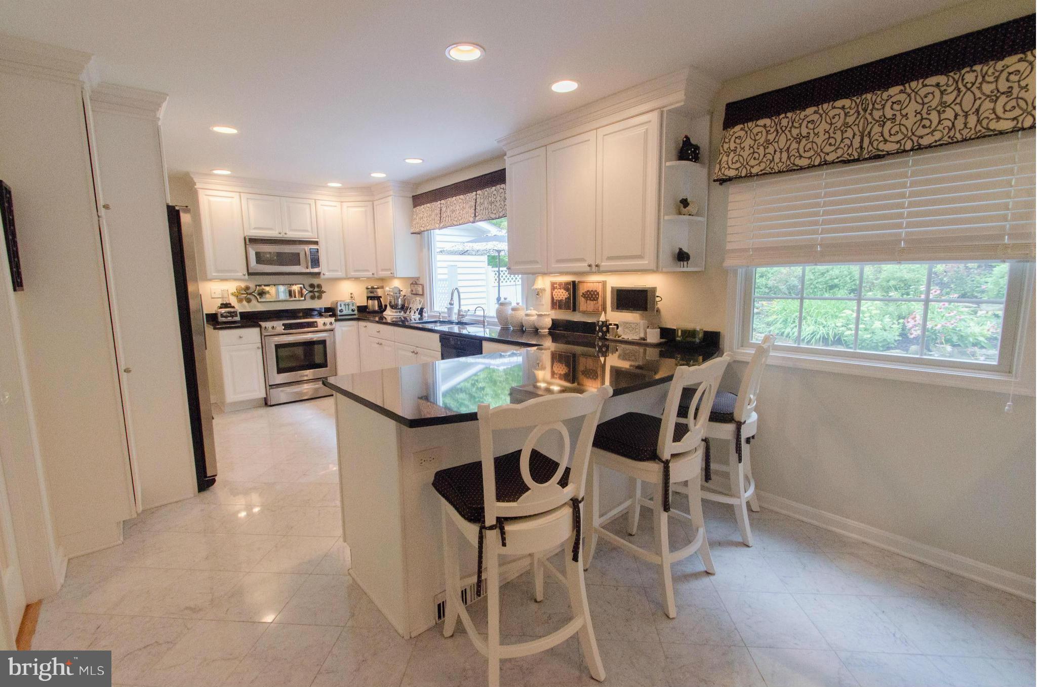 16402 Falls Road Monkton, MD 21111 - Photo 10 of 30 Great counter space leads to breakfast bar