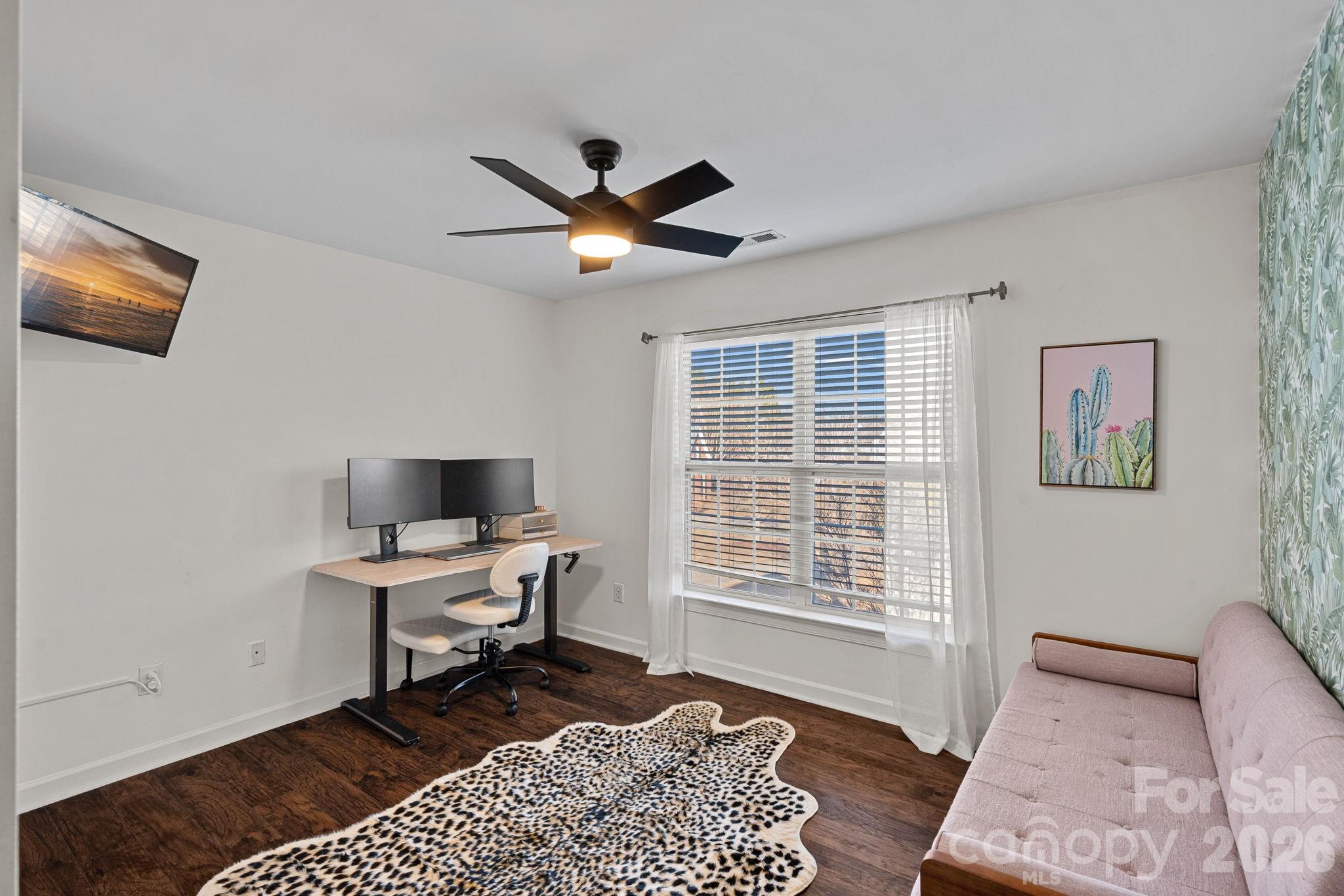 6110 Flowergate Lane Waxhaw, NC 28173 - Photo 30 of 39 a workspace with wooden floor and a window